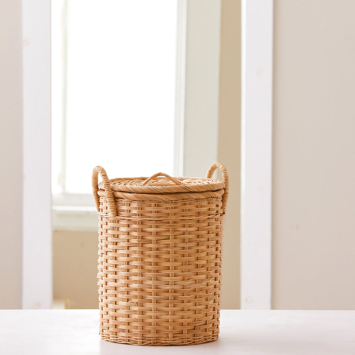 Round rattan storage basket. Unique storage baskets with lids and handles. 5 sizes. Extra Small shown. Great basket for storage. XL, L, M, S, XS.