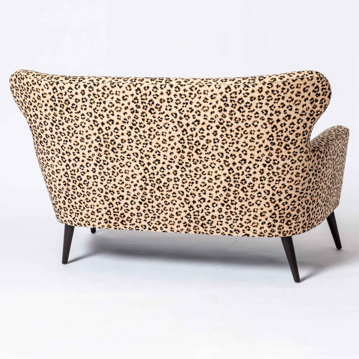 LEOPARD UPHOLSTERED SETTEE