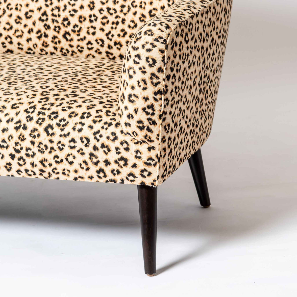 LEOPARD UPHOLSTERED SETTEE