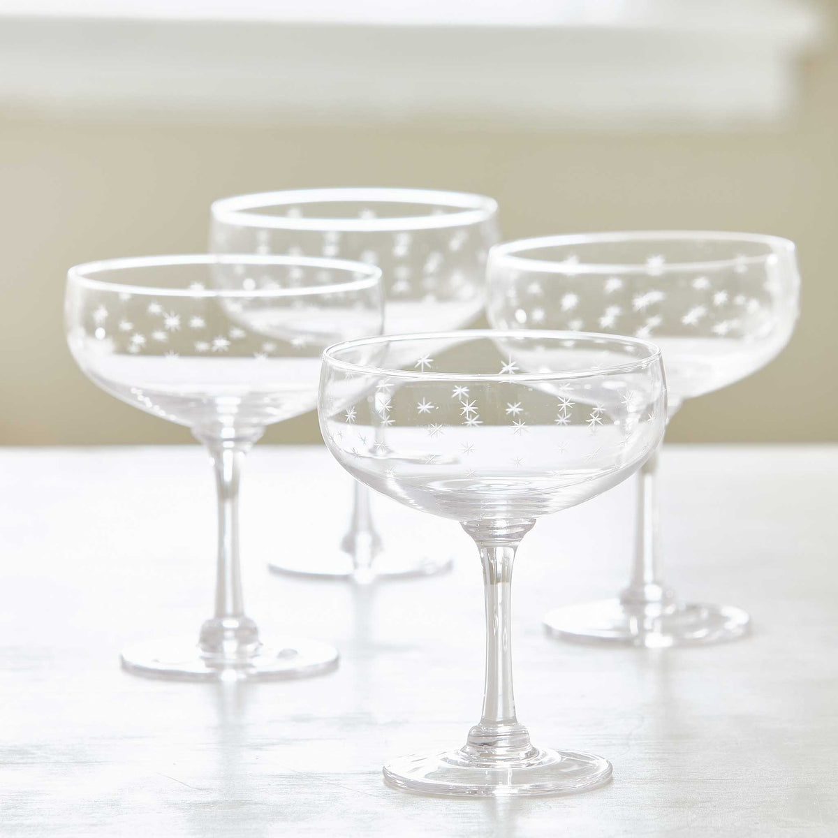 STAR-ENGRAVED CHAMPAGNE COUPES