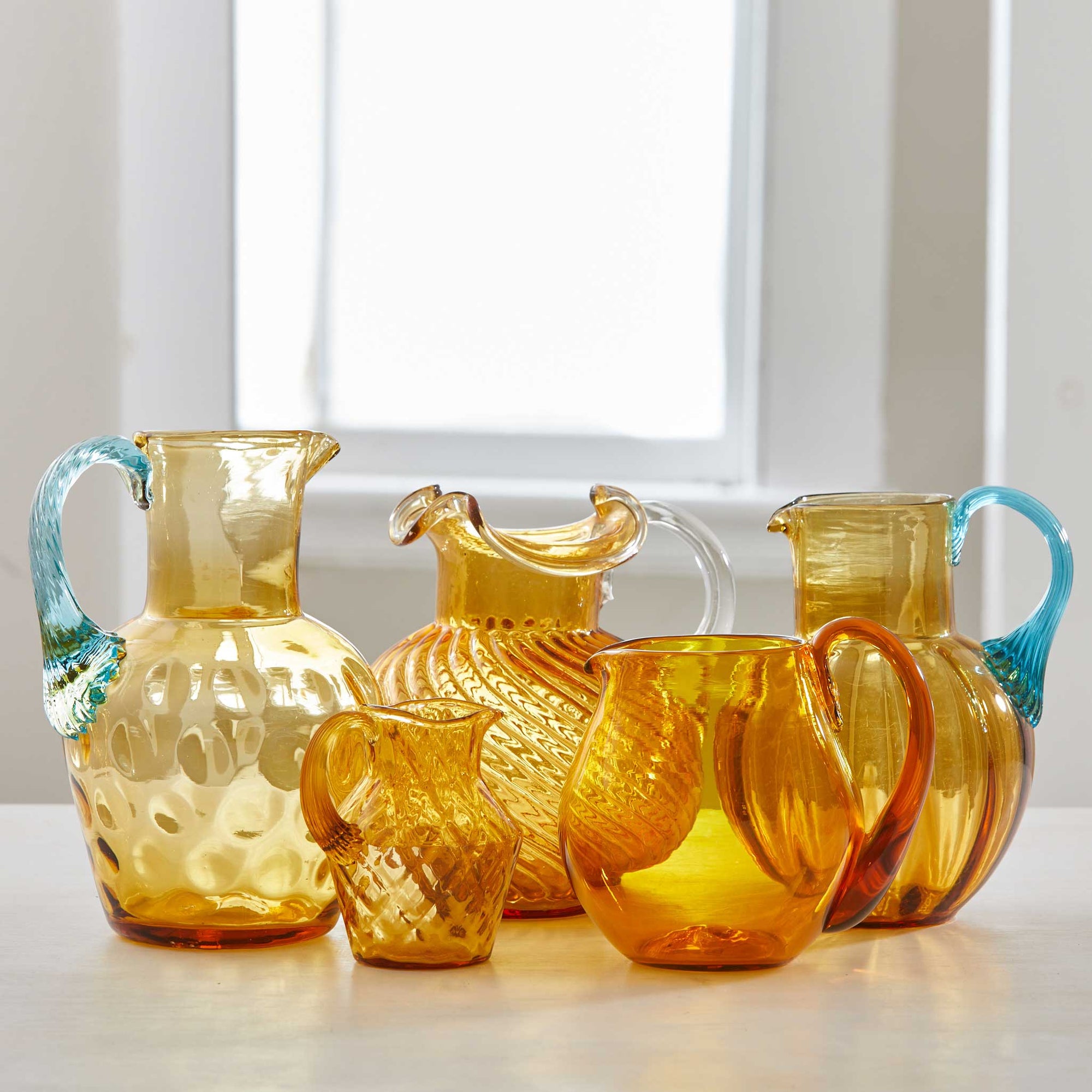 VINTAGE AMBER GLASS PITCHER COLLECTION