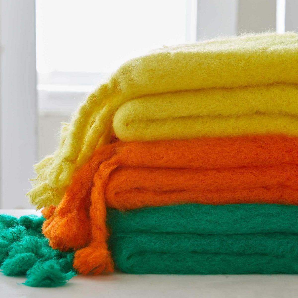 HAND-LOOMED MOHAIR FRINGE THROWS