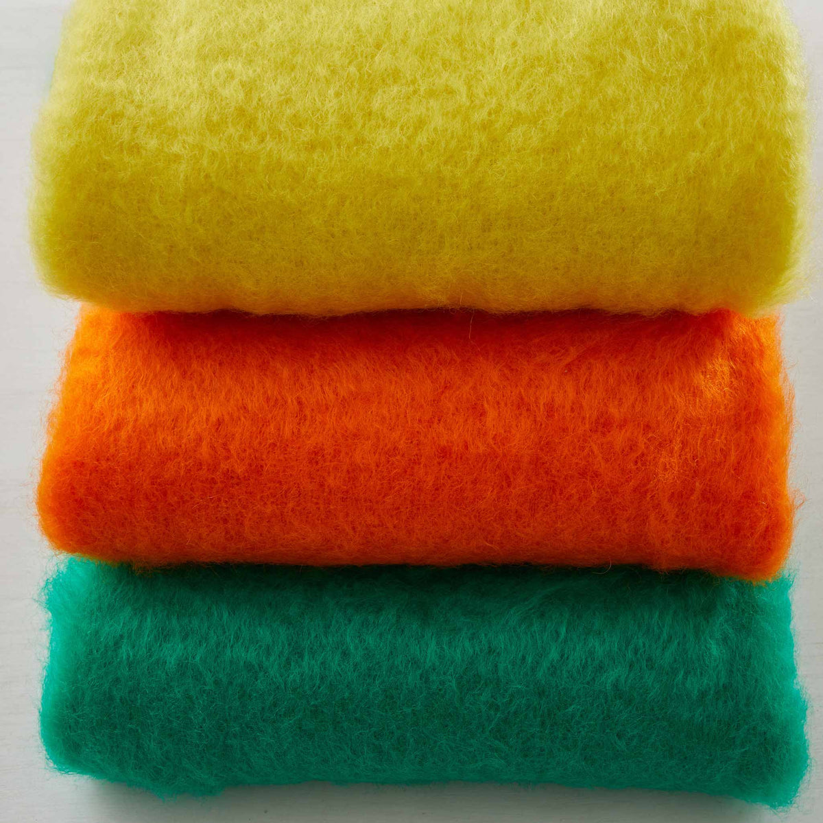 HAND-LOOMED MOHAIR FRINGE THROWS