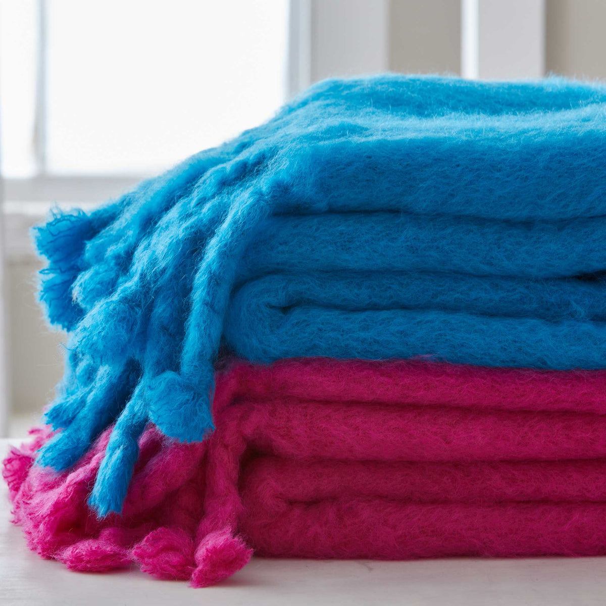 HAND-LOOMED MOHAIR FRINGE THROWS