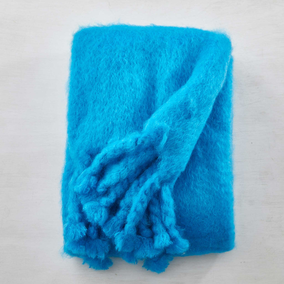 HAND-LOOMED MOHAIR FRINGE THROWS