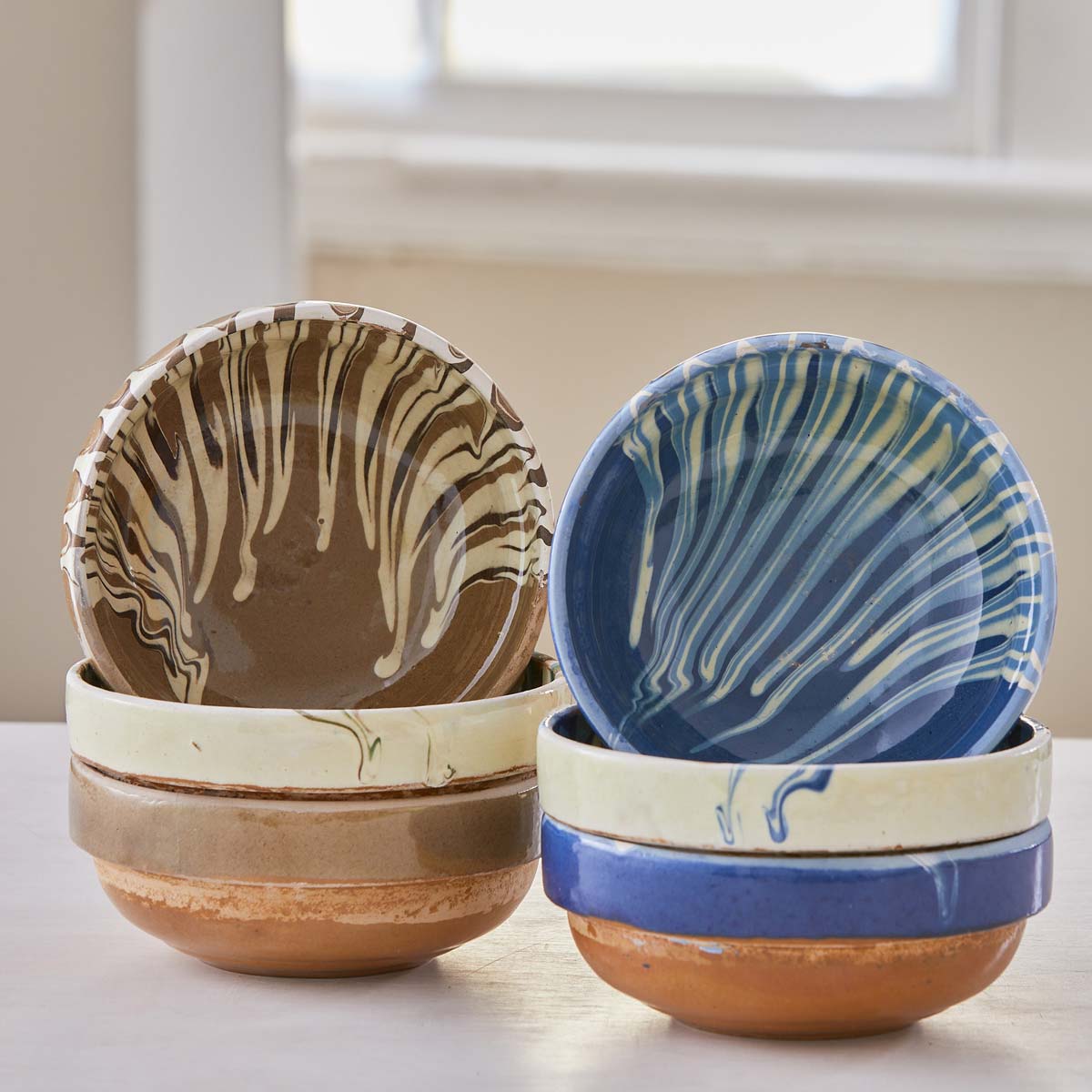 HAND-PAINTED TERRA COTTA BOWLS