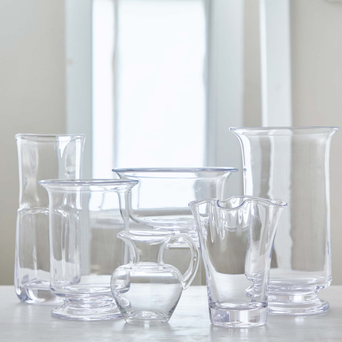 Collection of Simon Pearce glass bowls of various designs, all made of lead-free glass.