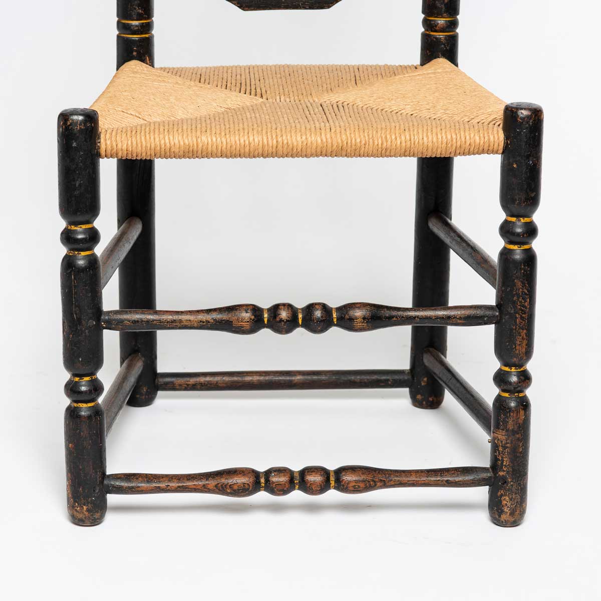 LATE 19th CENTURY EBONIZED RUSH SEAT CHAIR