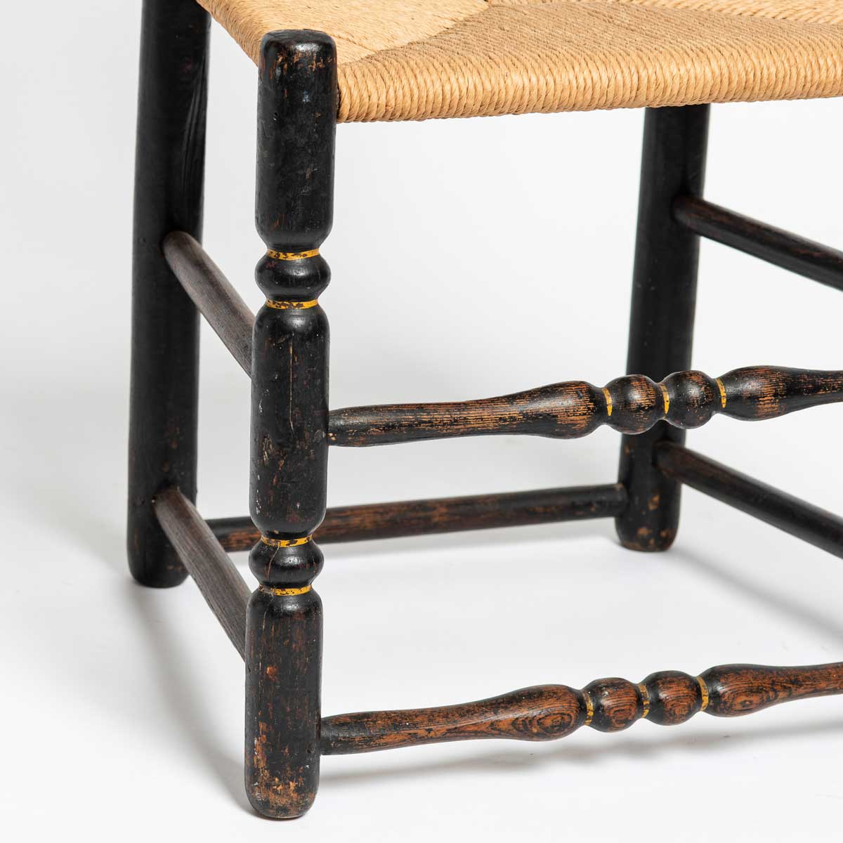 LATE 19th CENTURY EBONIZED RUSH SEAT CHAIR