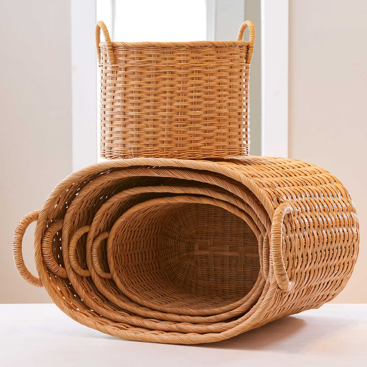 Oval rattan storage baskets with lids and handles. Perfect baskets for clothes, bathroom storage baskets, or baskets for shelves. XL, L, M, S, XS.