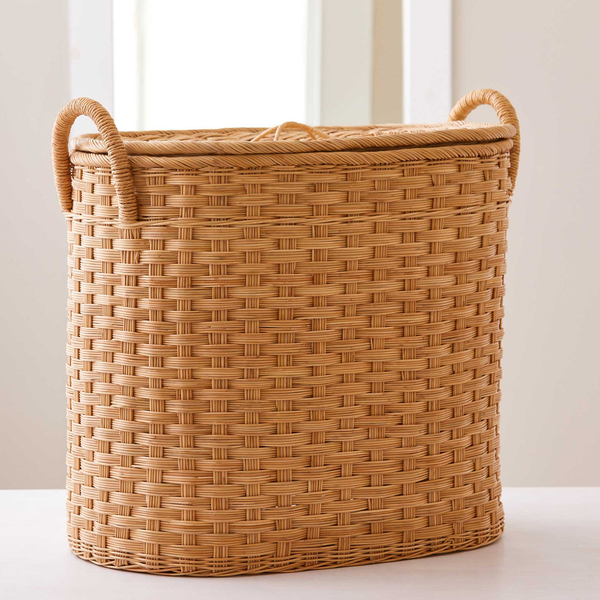 Oval rattan storage basket. Unique storage baskets with lids &amp; handles. 5 sizes. Extra Large basket shown. Great basket for storage. XL, L, M, S, XS.
