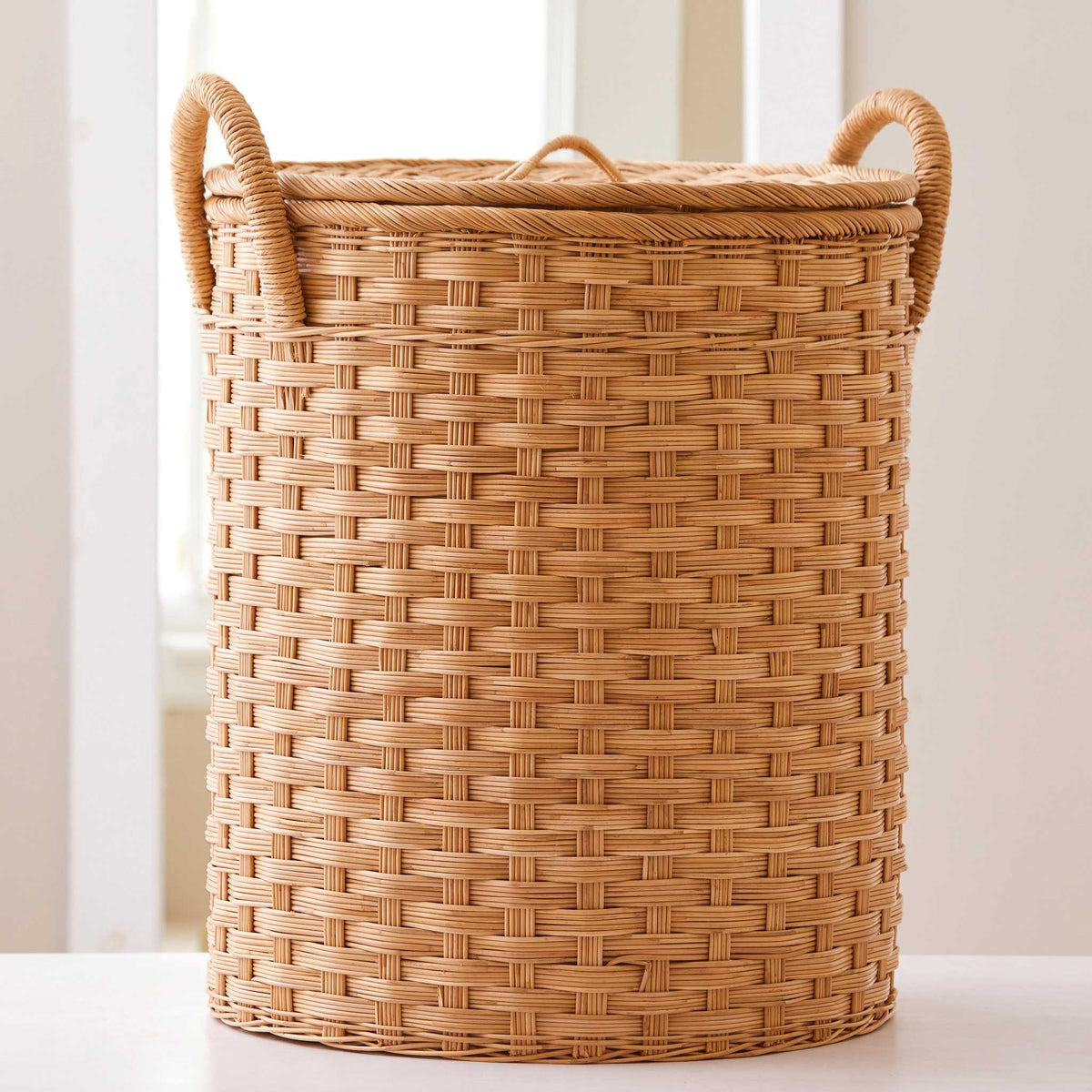 Round rattan storage basket. Unique storage baskets with lid and handles. 5 sizes. Extra Large shown. Great basket for storage. XL, L, M, S, XS.