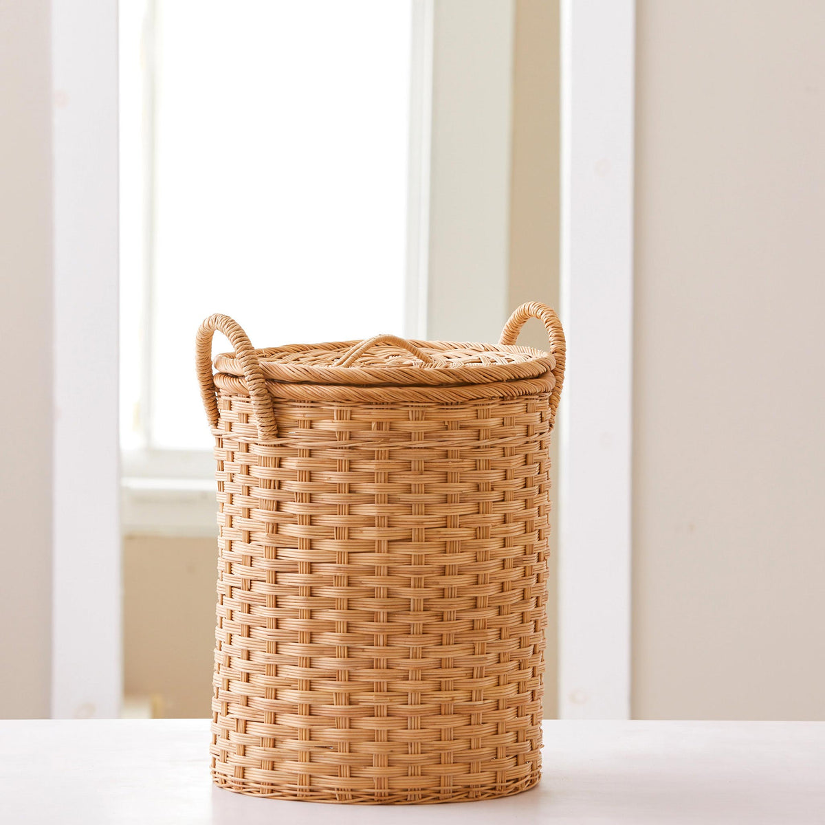Round rattan storage basket. Unique storage baskets with lids and handles. 5 sizes. Small basket shown. Great basket for storage. XL, L, M, S, XS.